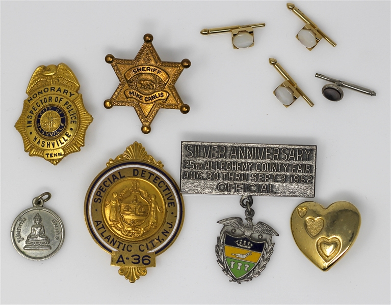 Moe Howard's Honorary Police Badges & Pins -- Includes 4 Badge Pins Including Ones for Nashville & Atlantic City; 4 Cufflinks; 1 Pendant; 1 Gold Heart-Shaped Pin From the Variety Club -- Very Good